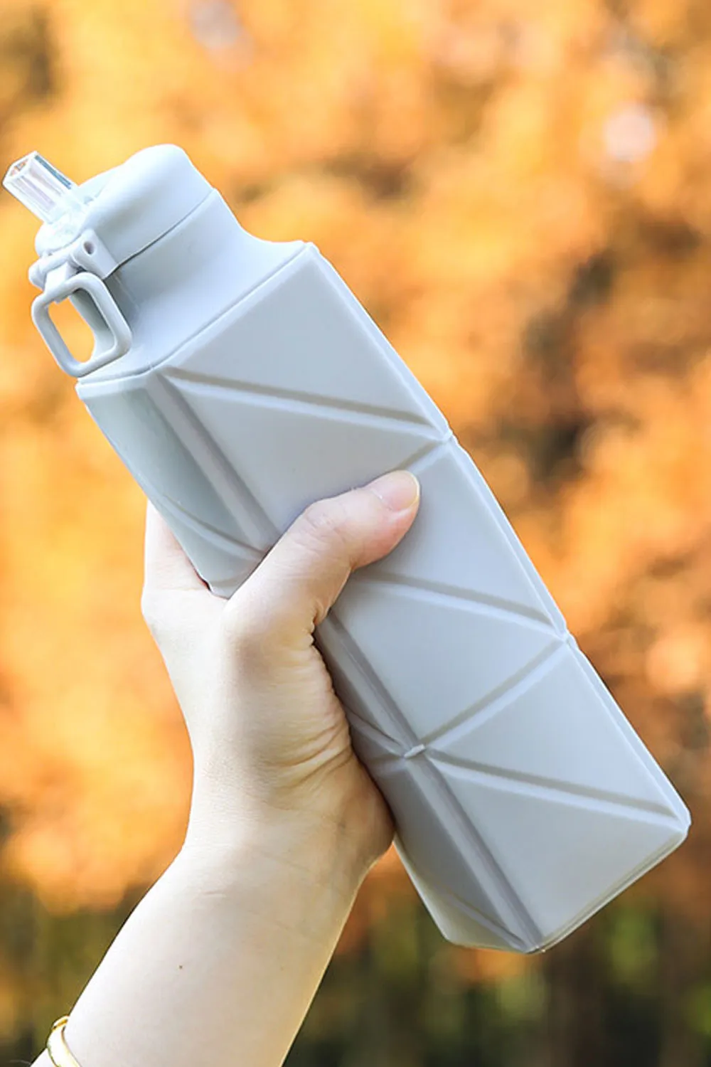 New outdoor platinum silicone rotary folding sports water bottle creative retractable water bottle water bottle